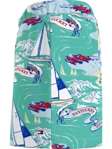 Short de baño celeste con estampado de motivos náuticos en rojo, blanco y azul.