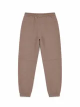 Pantalón de jogging color gris oscuro, con cintura elástica ajustable mediante cordón, bolsillos laterales y puños elásticos en los tobillos. Presenta costuras horizontales decorativas en las rodillas.