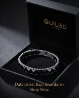 Pulsera de eslabones rectangulares facetados de cerámica negra con cierre de seguridad de acero inoxidable.
