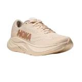 Championes de running Hoka Rincon 4, color beige con suela gruesa y el logo de la marca en un tono más oscuro en el lateral.