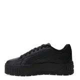 Championes urbanos Puma modelo Karmen II L, color negro con detalles en plateado. Presentan una silueta de plataforma con suela robusta y texturizada, confeccionados en cuero sintético con cordones al tono.