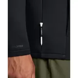 Buzo de entrenamiento Under Armour con cierre frontal parcial, cuello alto y bolsillos laterales con cremallera. Presenta un diseño híbrido con tejido elástico resistente al agua en la parte frontal y tejido de punto transpirable en mangas y espalda.