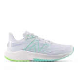 Championes de running New Balance FuelCell Propel v3, color blanco con detalles en verde agua y verde flúor.
