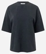 Blusa de corte oversized, color negro, con cuello redondo y mangas cortas. Confeccionada en una mezcla de poliéster y algodón.