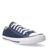 Championes urbanos de lona azul marino con suela de goma blanca y cordones blancos.