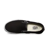 Championes Vans Classic Slip-On negros con suela blanca.