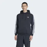 Canguro con capucha Adidas color negro, con las clásicas tres tiras blancas en las mangas y el logo del Trifolio bordado en el pecho. Cuenta con bolsillo tipo canguro y cordón ajustable en la capucha.