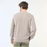 Sweater de punto de cuello redondo, con diseño liso y textura acanalada, de corte clásico.