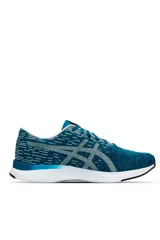 Championes deportivos Asics Streetwise de color azul con estampado de líneas horizontales blancas y grises, logo lateral gris y suela blanca.