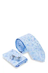 Set de regalo Florenzi, compuesto por corbata azul con estampado de flores blancas, pañuelo de bolsillo a juego y gemelos forrados en la misma tela. Presentado en caja negra con el logo de la marca.