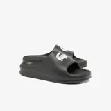 Chanclas negras de construcción monobloque IMEVA, con interior acolchado para mayor sujeción y amortiguación. Presentan el logo de cocodrilo en contraste blanco en la parte superior.