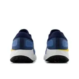 Championes de running New Balance Fresh Foam X Evoz V4, color azul con detalles en azul marino, amarillo y rojo.