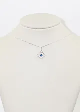 Collar de plata 925 con dije de ojo turco con circonias blancas y un cristal azul en el centro.