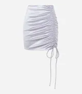 Minifalda color lila de satén con fruncido lateral y cordones ajustables.