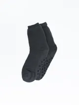 Medias de sherpa color negro con antideslizante.