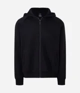 Buzo canguro negro Blue Steel de fleece con capucha, manga larga y cierre frontal. Cuenta con lettering bordado en la capucha y un diseño circular estampado en la espalda en color blanco con tipografía gótica.