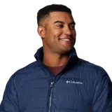 Campera acolchada de hombre en color azul marino, con cierre frontal completo, cuello alto y bolsillos laterales con cremallera. Cuenta con tecnología Omni-Heat para retención de calor y acabado Omni-Shield resistente al agua y manchas.