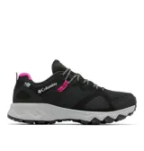 Championes de senderismo Columbia, modelo Peakfreak Hera Outdry, color negro con detalles en gris y fucsia. Presentan tecnología impermeable OutDry, entresuela TechLite+ para amortiguación y suela Adapt Trax para tracción en diversos terrenos.