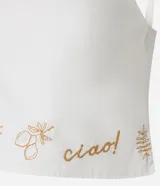 Blusa confeccionada en sarga de algodón, de color blanco, con escote cuadrado y tirantes finos. Presenta un detalle bordado en la parte inferior con motivos botánicos y la palabra ciao.