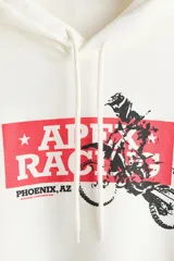 Canguro de corte holgado en color blanco, con capucha ajustable mediante cordones, bolsillo frontal tipo canguro y puños acanalados. Presenta un estampado gráfico en el pecho con la leyenda 'Apex Racing' y la silueta de un motociclista.