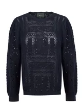 Sweater de tejido calado color azul marino, con cuello redondo y mangas largas con diseño abullonado en los hombros.