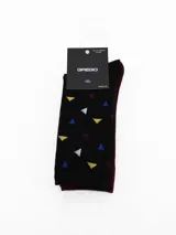 Pack de dos pares de medias de caña media. Un par es de color negro liso y el otro par es de color gris con estampado de círculos horizontales.