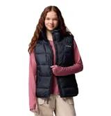 Chaleco acolchado Columbia modelo Pike Lake III Vest, color negro, con cuello alto, cierre frontal y bolsillos laterales con cremallera. Incorpora tecnología Omni-Heat para retener el calor corporal y aislamiento térmico.