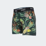 Boxer estampado con hojas y flores, con cintura elástica negra con la marca Stance en blanco.