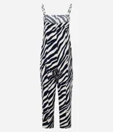 Mono largo de sastrería marca Cortelle, confeccionado en crepé con elastano, con estampado animal print de cebra en tonos beige y negro. Presenta escote recto, tirantes finos regulables, corte wide leg en las piernas y un cinturón ancho ajustable en la cintura.