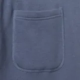 Pantalón de jogging azul con cintura elástica ajustable con cordón, bolsillos laterales y logo Hurley estampado en el muslo.