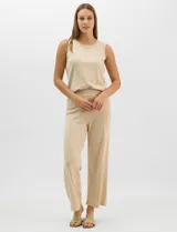 Pantalón tejido de corte recto y diseño fluido, color amarillo, con cintura ancha elastizada.