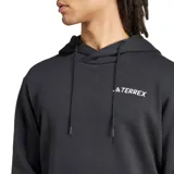 Canguro negro con capucha y cordones ajustables, bolsillo tipo canguro delantero y logo de Adidas Terrex impreso en el pecho.