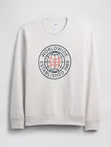 Buzo Gap color gris claro con cuello redondo, confeccionado en algodón y poliéster. Presenta un diseño estampado en el frente con un círculo que incluye la inscripción 'Worldwide Established 1969' y el logotipo de Gap en el centro en color salmón.