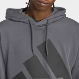 Buzo con capucha Adidas de corte estándar, confeccionado en felpa francesa. Presenta un diseño de hombros caídos, bolsillo tipo canguro, puños y bajo acanalados, y el logo de las 3 Barras estampado en gran tamaño en el pecho.