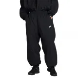 Pantalón Nike de tejido woven, corte oversize y diseño deportivo, color negro con cintura elástica y puños ajustados.