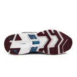 Championes deportivos Diadora Mythos Blushield Volo 2 para mujer, color blanco con detalles en azul marino y bordó. Presentan una malla texturizada, superposiciones sintéticas, cordones azules y suela blanca con tecnología Blushield.