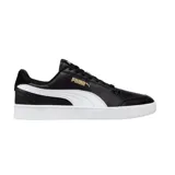 Championes Puma Shuffle de hombre, color negro con franja lateral (Formstrip) blanca y detalles dorados. Tienen un diseño de corte bajo inspirado en el baloncesto, con empeine de piel sintética y suela de goma blanca.