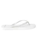 Ojotas Rip Curl modelo Premium Surf Bloom Open Toe, color blanco con tiras finas plateadas y detalle de aplicación brillante en el lateral.