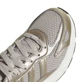 Championes deportivos Adidas modelo Eclyptix 2000 W, con diseño de malla y revestimientos metalizados en tonos beige. Presentan cordones al tono, entresuela acolchada y suela de goma con refuerzos en negro.