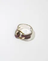 Anillo de plata 925 con dublé de oro y zirconias rosas.