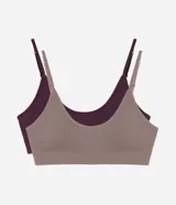 Kit de dos soutiens tipo top de Lov, confeccionados en poliamida sin costuras. Incluye un corpiño color bordó y otro color gris, ambos con escote redondo, copas removibles y breteles finos regulables.