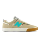 Championes de skate New Balance Numeric 306, modelo profesional de Jamie Foy. Diseño en color beige con logo lateral en turquesa, confeccionados en gamuza ligera y paneles de malla transpirable. Presentan suela vulcanizada de perfil bajo con refuerzo de goma visible.