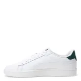 Championes urbanos Puma modelo Smash 3.0 L, color negro con detalles en blanco. Presentan el logo de la marca en el lateral y la lengüeta, con cierre de cordones y suela de goma blanca.