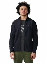 Campera polar de hombre Mountain Hardwear Microchill Full Zip, de color negro, con cierre frontal completo, cuello alto y bolsillos laterales con cierre. Diseño de mangas raglán para mayor movilidad y pequeño logo de la marca bordado en el pecho.