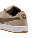 Championes Puma modelo Suede XL, color azul vibrante con detalles en blanco. Presentan un diseño clásico de gamuza con cordones anchos, suela de goma texturizada y el logo de la marca en dorado en el lateral.