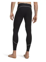 Calza deportiva larga Under Armour HeatGear Elite, color negro, con cintura elástica visible y paneles de malla en la entrepierna para mayor ventilación. Diseño ergonómico con costuras estratégicas para mayor durabilidad y libertad de movimiento.