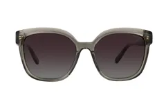 Lentes de sol Azzaro con armazón de acetato traslúcido en tono gris y cristales polarizados con degradado oscuro.