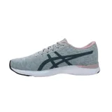 Championes Asics Streetwise de mujer, color gris oscuro con detalles en rosa y logo de la marca en los laterales. Capellada de malla transpirable y entresuela de EVA para mayor amortiguación.