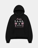 Canguro negro con capucha y bolsillo tipo canguro, confeccionado con felpa suave premium. Presenta un estampado frontal con texto en tonos rosados y blancos, palmeras y estrellas.