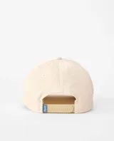 Gorro tipo gorra con visera Rip Curl color beige, con cordón blanco en la base de la corona y bordado frontal en tono azul.